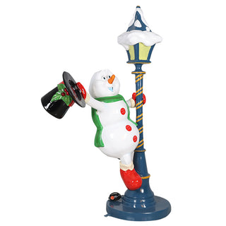 Snowman On A Light Post