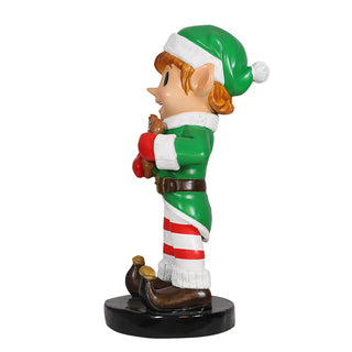 Elf Boy Holding Gingerbread