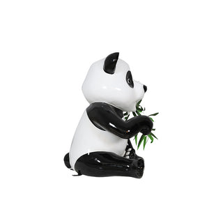 Panda Cub Eating Bamboo